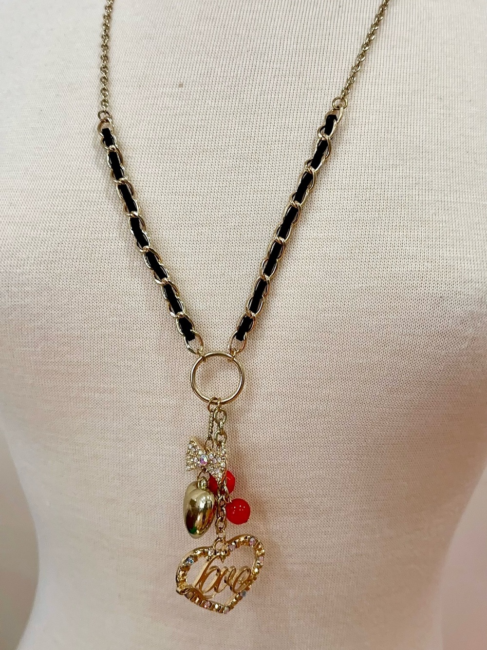 Gold Tone 'Love' Heart Pendant Necklace with Black Chain Accents